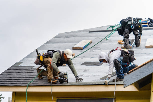 Professional Gutter Installation technician working in Camden, NY